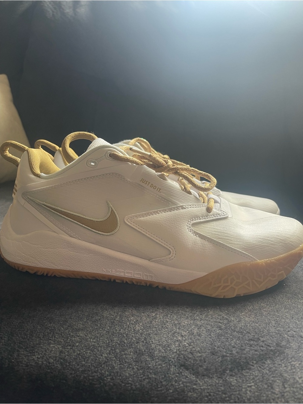 Nike women’s White & Gold volleyball shoes